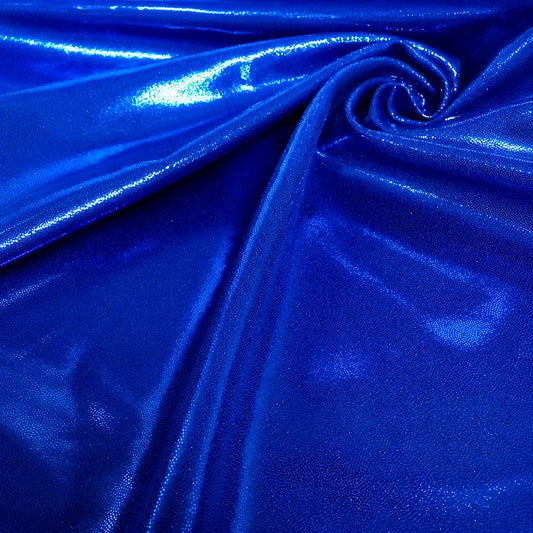 A close-up of shiny metallic royal blue fabric.