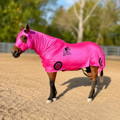 Horse wearing a pink barbie costume sleazy with a Barbie logo in an outdoor setting