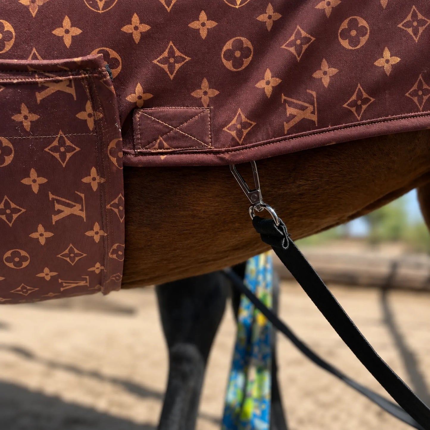 LV faceless full body sleazy horse belly view and showing leg strap hardware