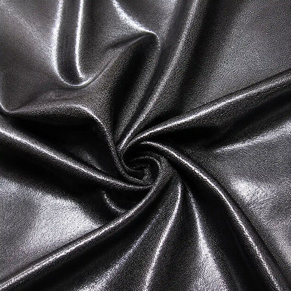 Close-up of metallic black fabric with folds