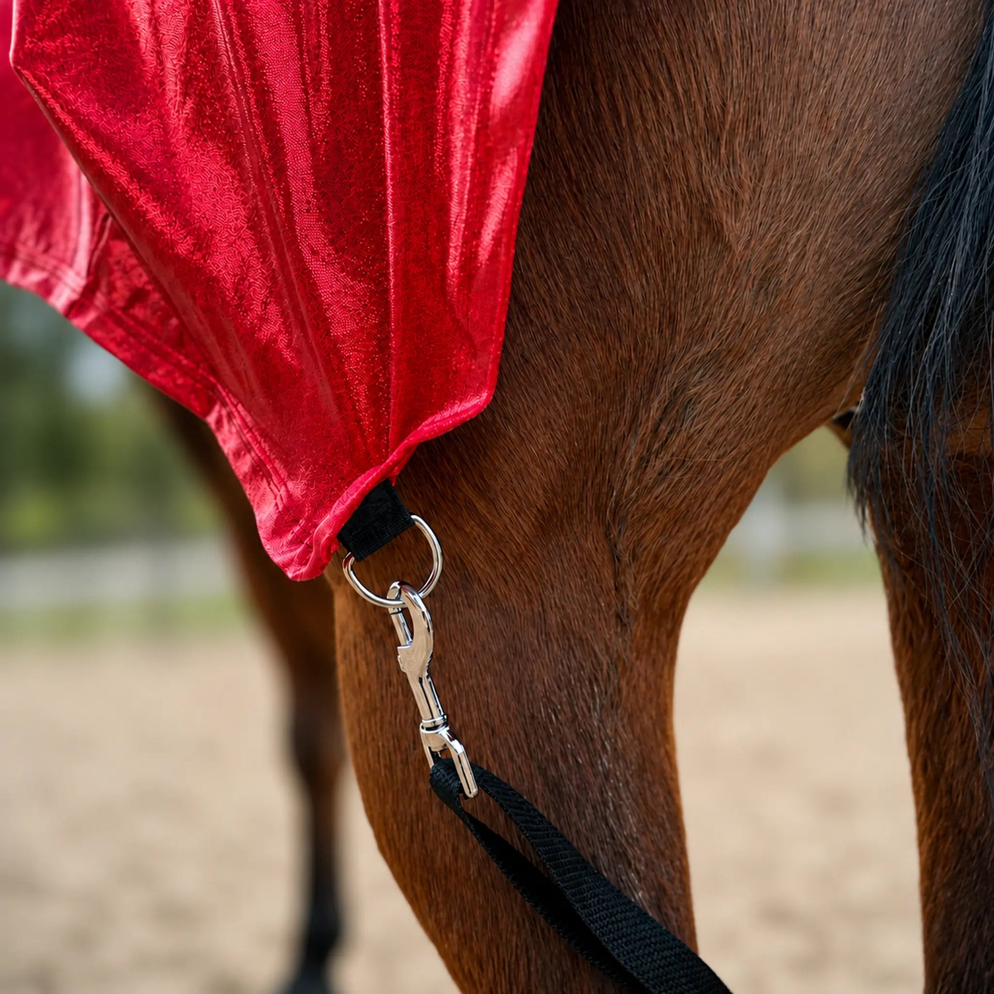 shiny metallic red faceless full body sleazy on horse with leg strap