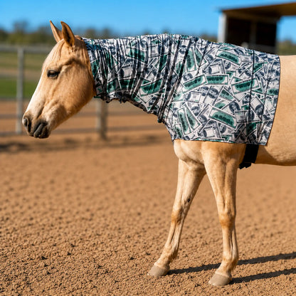 Horse wearing a money faceless hood in an outdoor setting