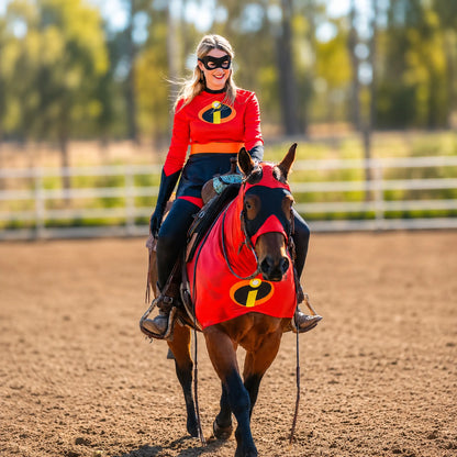Person riding a horse wearing superhero incredibles metallic red sleazy costumes in an outdoor setting