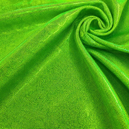 Bright metallic lime green textured fabric draped in a spiral pattern.